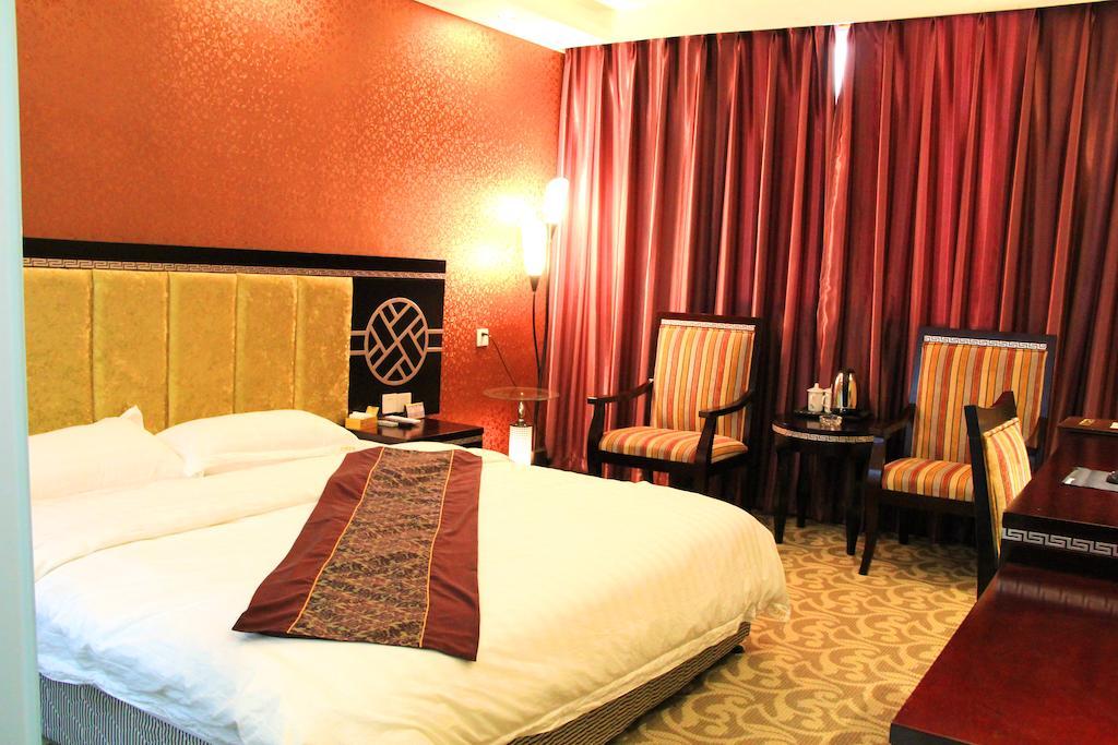 Jiuxiang Hotel Jiuzhaigou Kamer foto