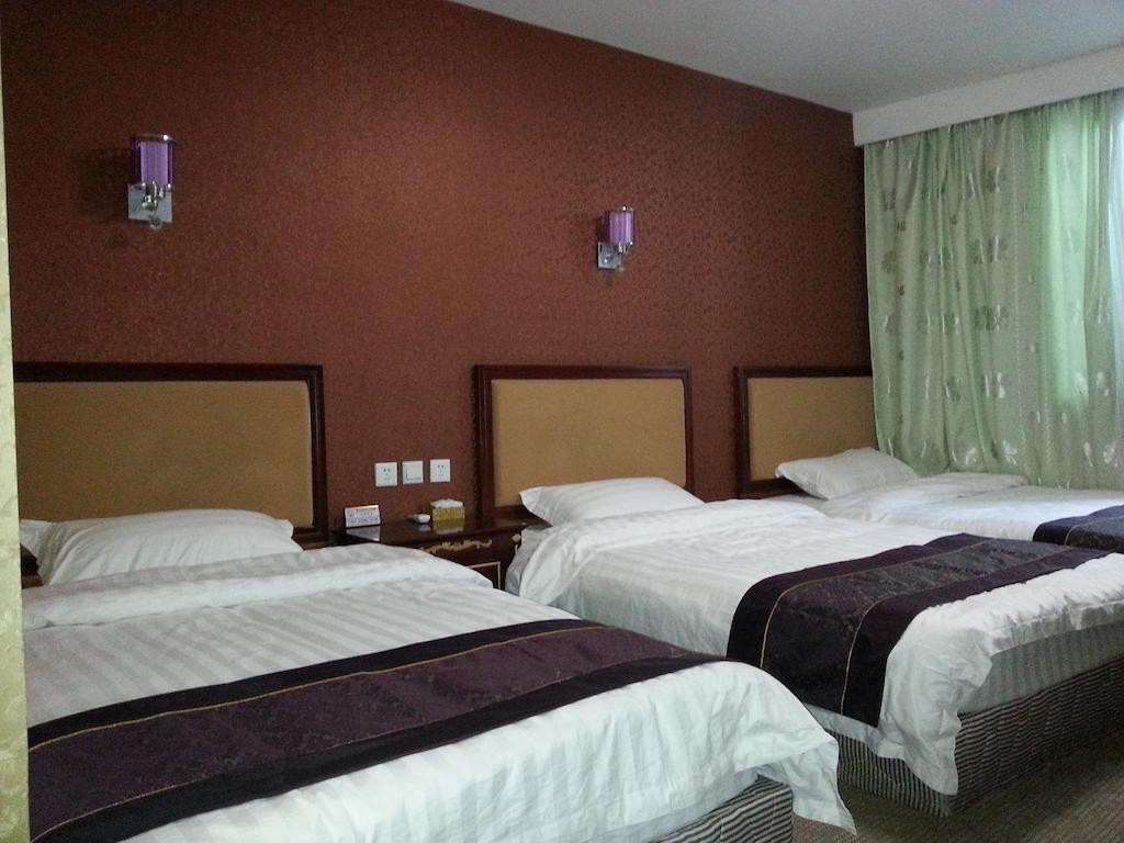Jiuxiang Hotel Jiuzhaigou Kamer foto