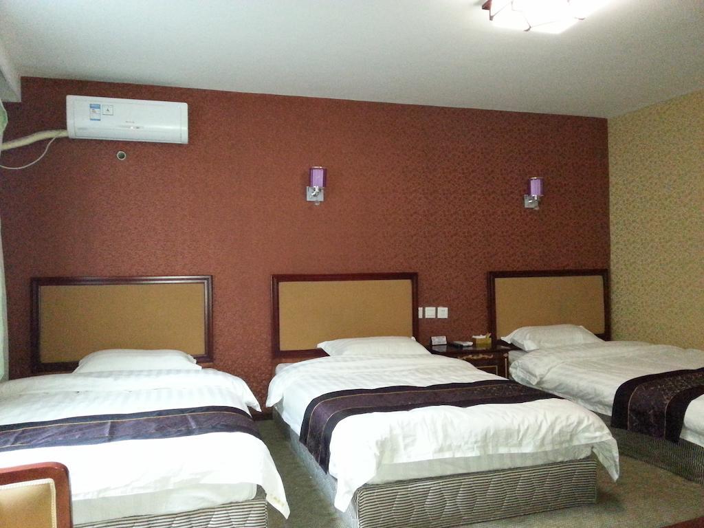 Jiuxiang Hotel Jiuzhaigou Kamer foto