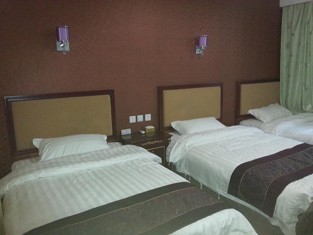 Jiuxiang Hotel Jiuzhaigou Kamer foto