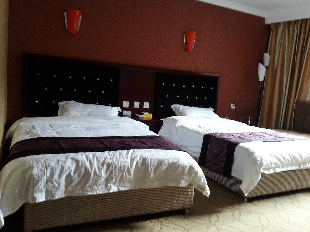 Jiuxiang Hotel Jiuzhaigou Kamer foto