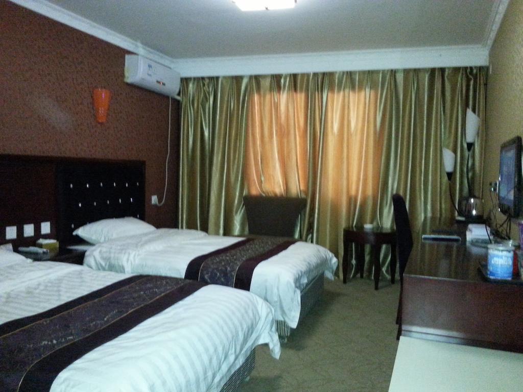 Jiuxiang Hotel Jiuzhaigou Kamer foto