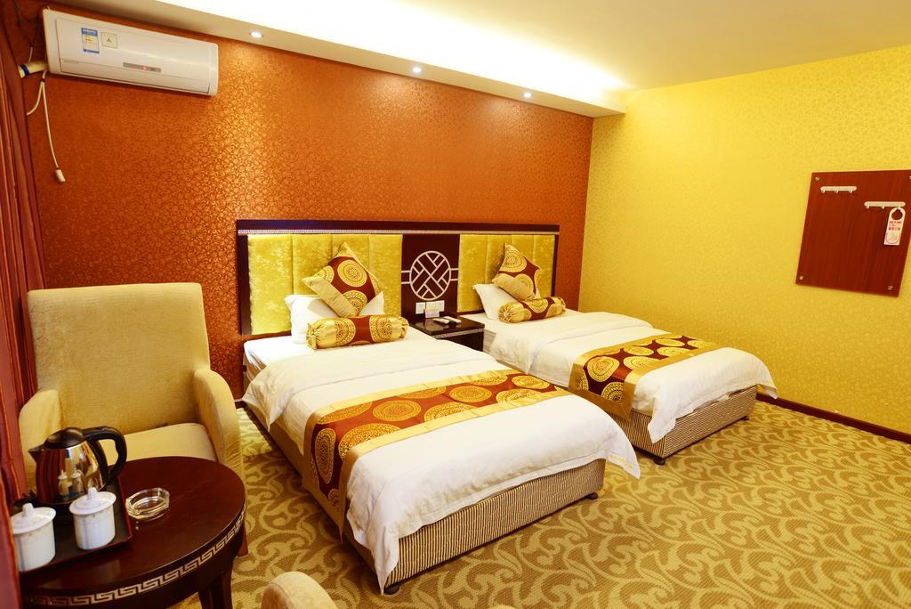 Jiuxiang Hotel Jiuzhaigou Kamer foto