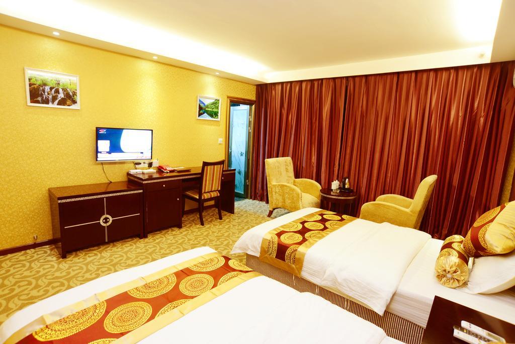 Jiuxiang Hotel Jiuzhaigou Kamer foto