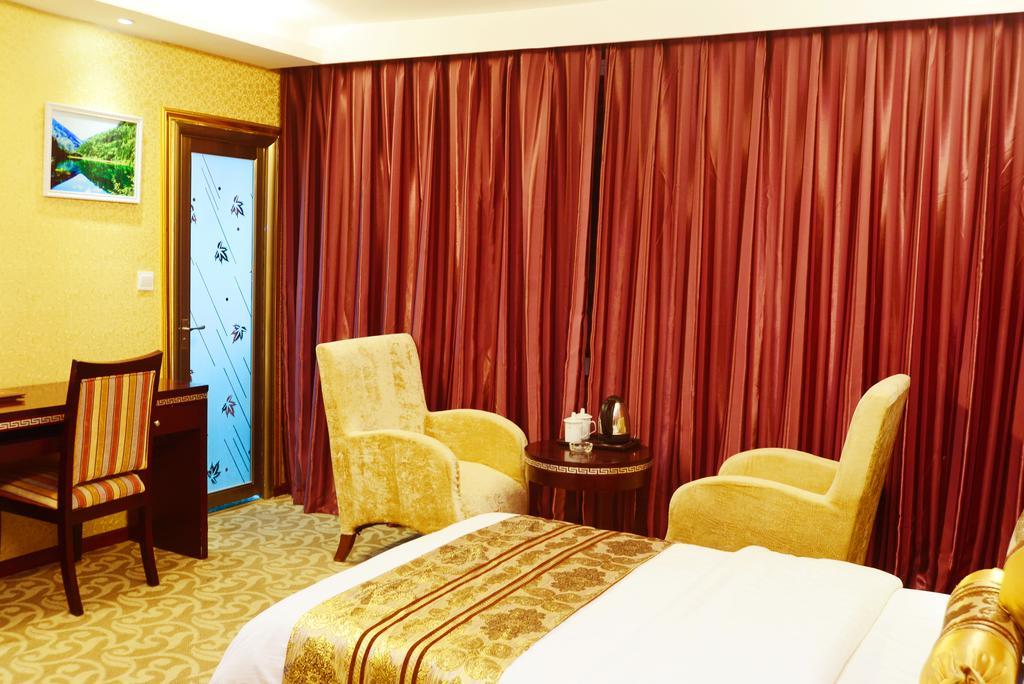 Jiuxiang Hotel Jiuzhaigou Kamer foto