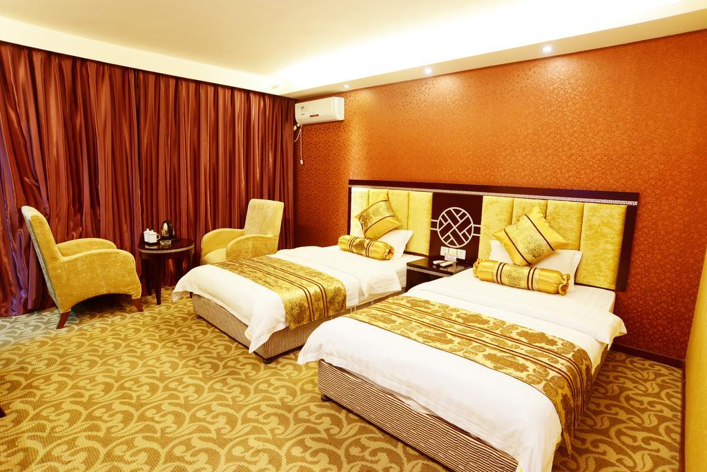 Jiuxiang Hotel Jiuzhaigou Kamer foto