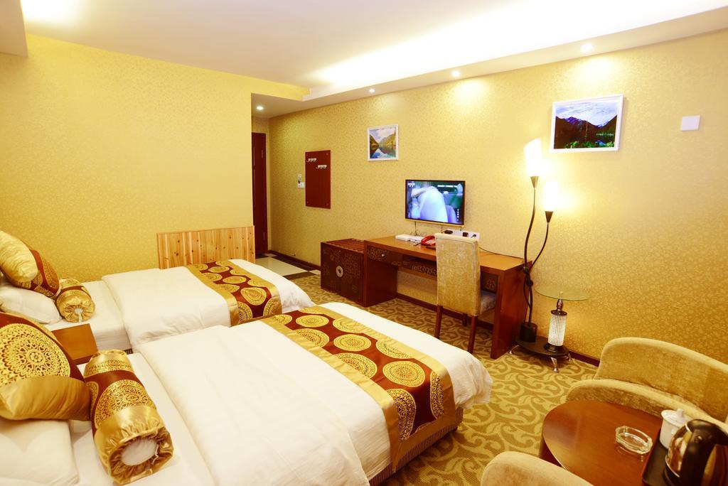 Jiuxiang Hotel Jiuzhaigou Kamer foto